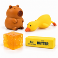 Squishy Box Inicial Plus: cuatro squishies intactos sobre fondo blanco